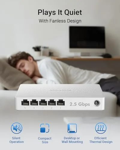 A home office desk with the switch connected to a desktop PC and a NAS