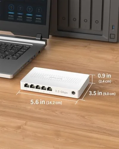 The switch running with all five ports connected and activity LEDs lit