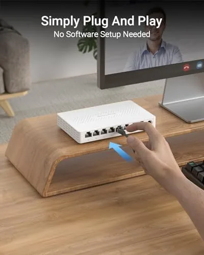 The BrosTrend 8 port switch next to a gigabit switch and the 5 port model