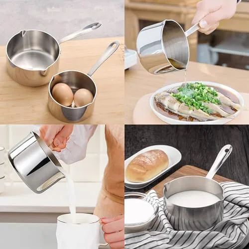 A single serving of hot chocolate in a mug beside the milk pot
