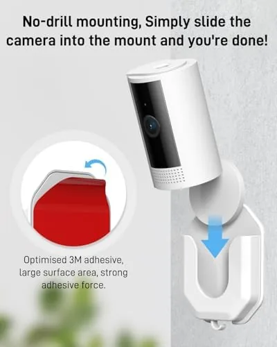 A Ring Indoor Cam attached to the adhesive wall mount in a hallway corner