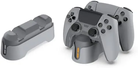 Two PS5 Edge controllers seated in the grey dual charging dock