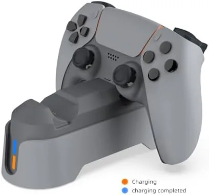 The charging dock placed beside a console on a tidy desk