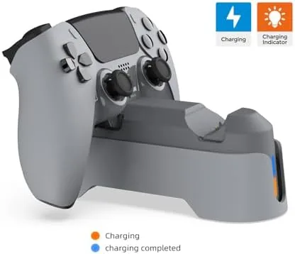 A hand picking up a fully charged Edge controller from the dock