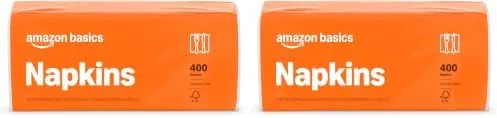 A hand pulling a napkin from the 400 count dispenser pack