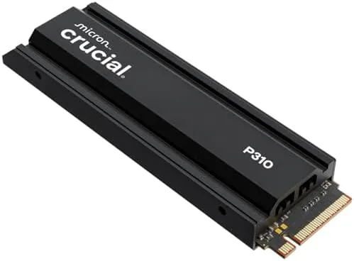 The Crucial P310 1TB Gen4 NVMe SSD with its heatsink on a desk