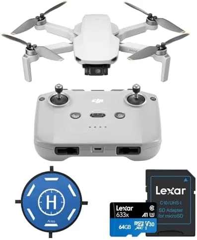 The DJI Mini 4K drone folded in a hand to show how small it is