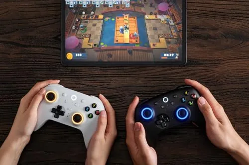 The controller being used on a couch setup with the 2.4GHz adapter plugged into a PC