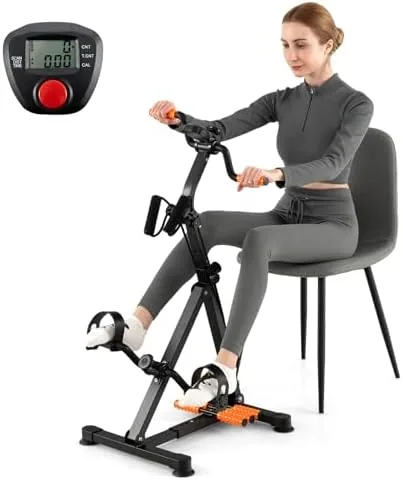 Compact pedal exerciser bike on the floor with the digital monitor visible