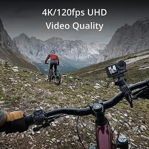 The Essential Combo laid out with the camera, batteries, and charging hub