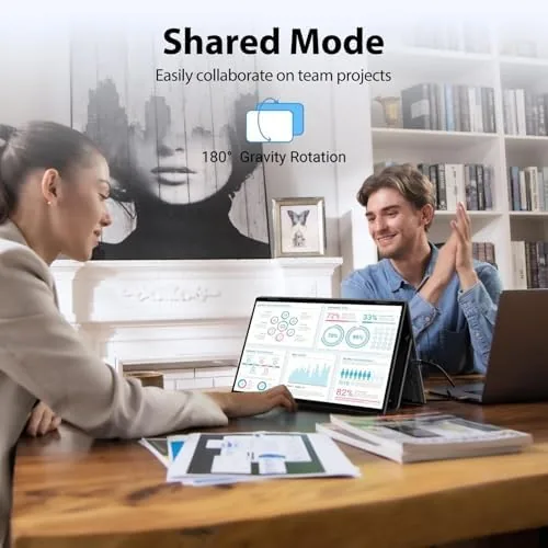 Spreadsheets and email displayed across the two monitor panels