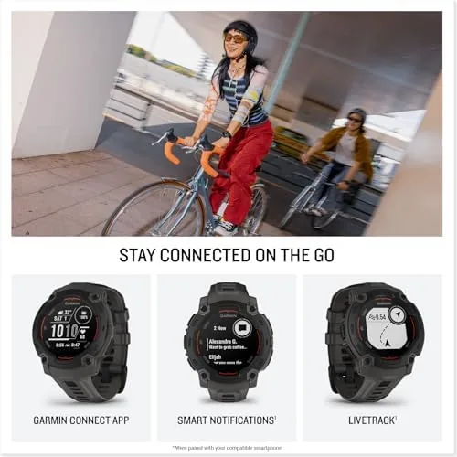 The Garmin Instinct E beside a touchscreen smartwatch for comparison
