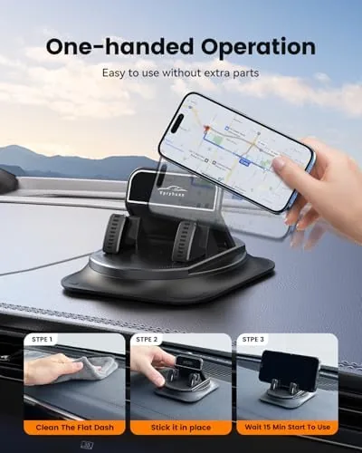 The holder mounted low on a windshield with the phone tilted toward the driver