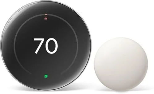 Google Nest Learning Thermostat Pro Edition in polished silver on a wall