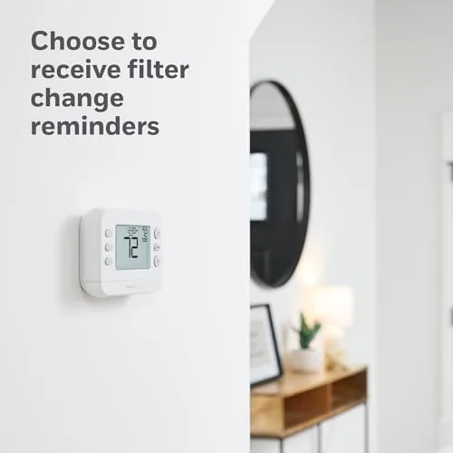 The thermostat display showing the scheduled temperature for the morning