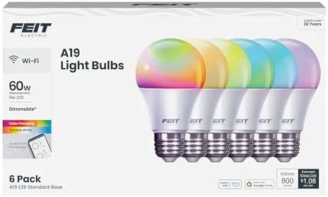 A Feit Electric A19 RGBW smart bulb glowing in a table lamp with color light