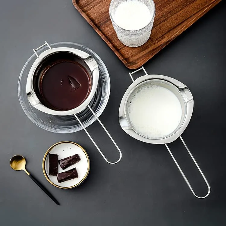 The stainless steel double boiler compared against a microwave bowl and electric melter
