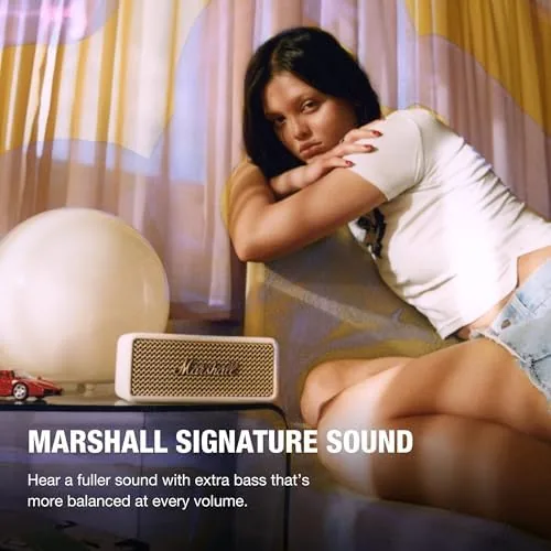 Close up of the Marshall script and gold control knob on the front grille