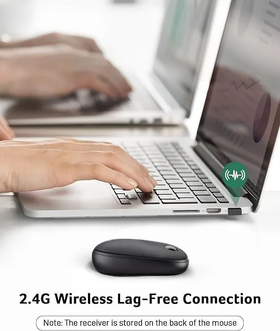The mouse plugged into a laptop with the USB receiver visible in the port