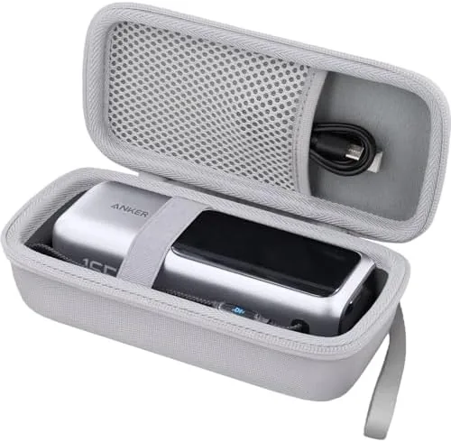 Close up of the padded interior, mesh pocket, and zipper of the case