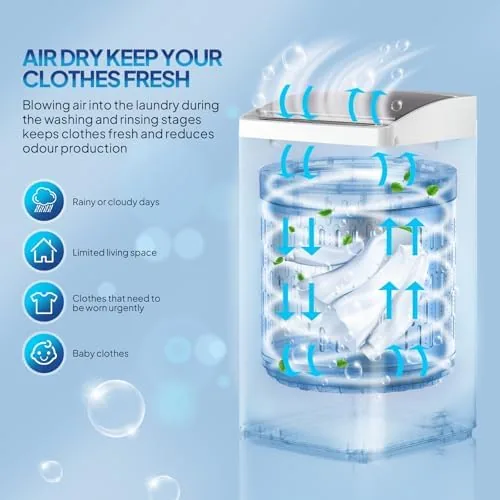 Freshly washed clothes being lifted from the stainless steel drum