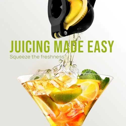 A halved lemon placed in the larger bowl of the Zulay squeezer ready to press