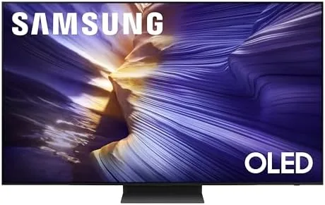 The Samsung 65 inch OLED S90F mounted on a wall showing a colorful movie scene