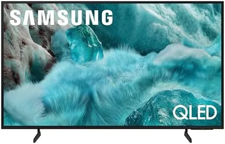 The 43 inch Samsung QLED Q7F on a stand in a living room showing a vibrant scene