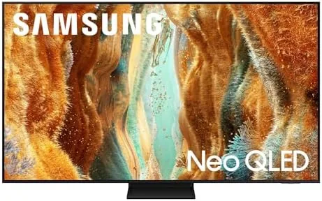 Samsung 55 inch QN70F Neo QLED TV on a stand in a bright living room