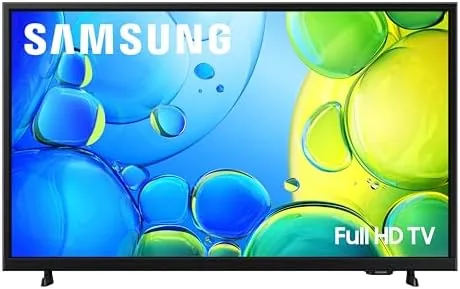 The SAMSUNG 40-inch F6000 smart TV set up in a guest bedroom