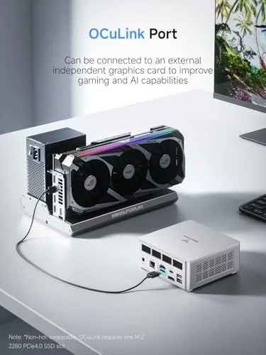 The UM880 Plus beside a budget mini PC and a mid tower desktop case