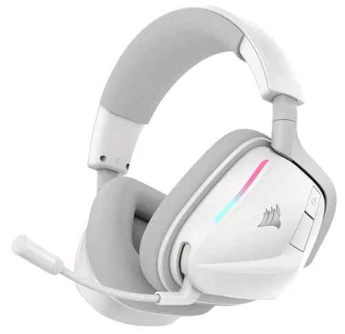 The white Corsair Void v2 wireless headset on a desk next to a keyboard