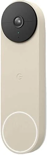 The Google Nest Doorbell Battery in Linen mounted on a front door frame