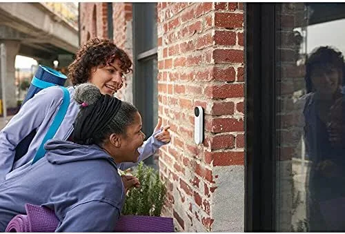 The Nest Doorbell next to a wired doorbell and a budget camera for comparison