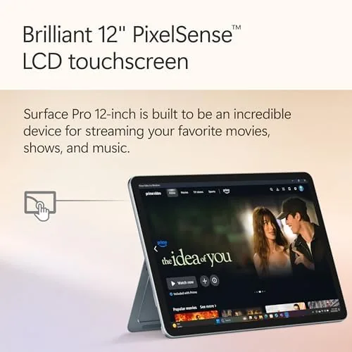Surface Pro in Ocean color on a flight tray table