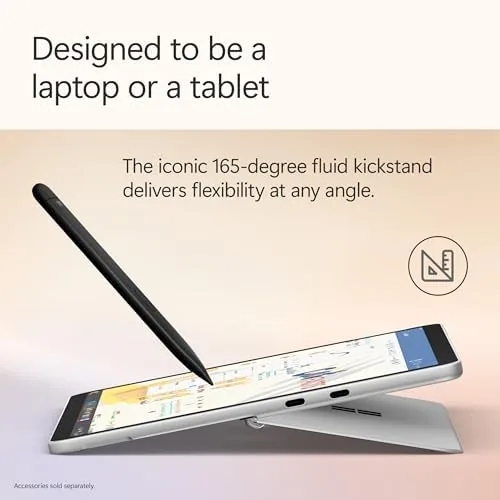 A person using the Surface Pro with the magnetic keyboard on a cafe table