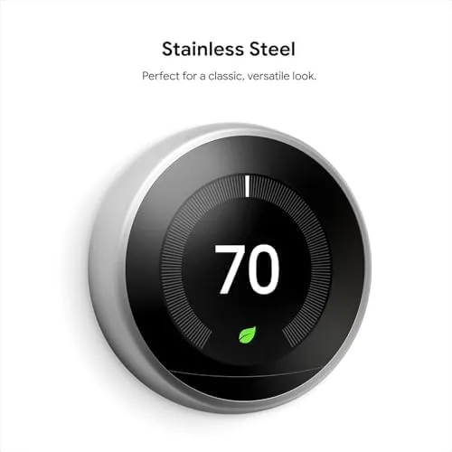 Close up of the thermostat dial with the leaf icon on the display