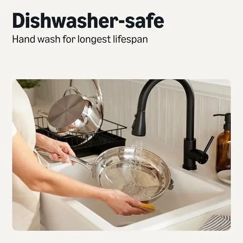 A home cook using the cookware set in a small apartment kitchen
