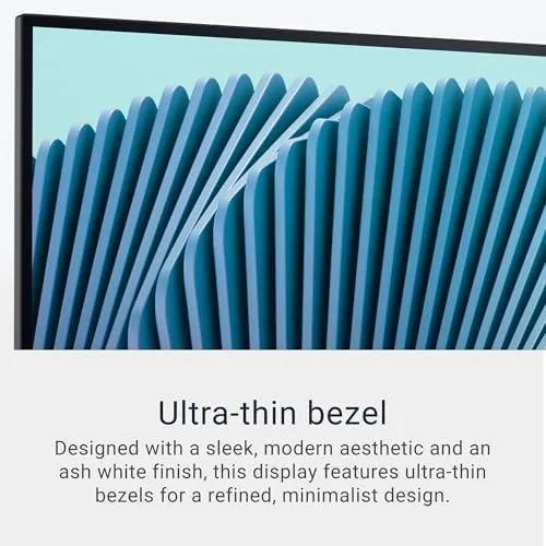 The Dell S2725QS monitor set up in a bright home office on an upper arm