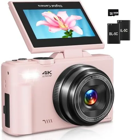 Pink 4K vlogging camera with the flip screen rotated toward the lens