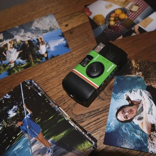 The QuickSnap next to a reusable film camera and a smartphone for comparison