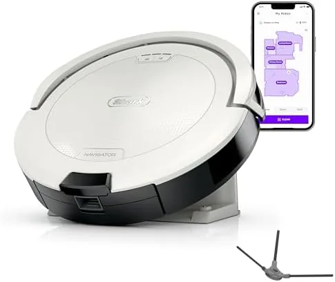 The white Shark Navigator robot vacuum AV2120 on a hard floor