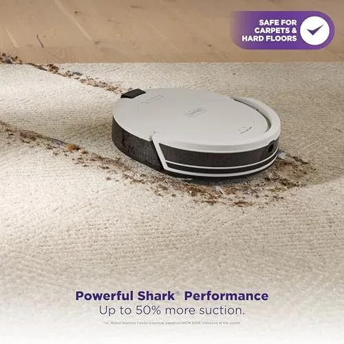 Close up of the robot vacuum showing the removable dust bin on top