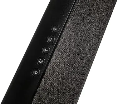 Wireless subwoofer placed beside the media console
