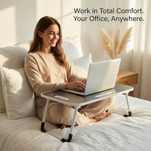 The BUYIFY 23" Foldable Lap Desk for Laptop Writing w/Cup Holder in real use