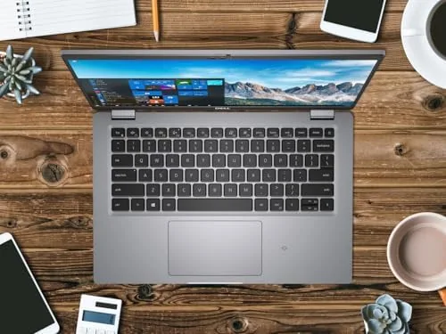 Latitude 5420 plugged into a USB-C charger on a desk at night