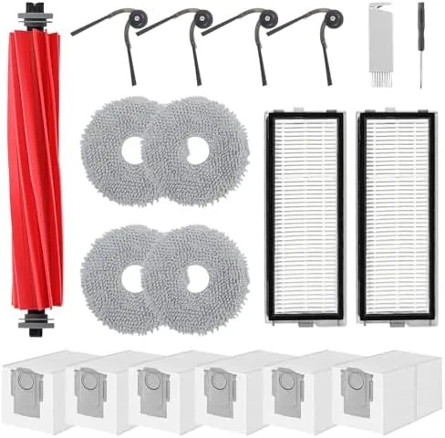 The complete replacement kit laid out with brush, mop cloths, filters, side brushes, and dust bags