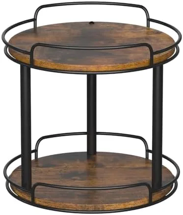 The LAMU two-tier wood lazy susan sitting on a kitchen countertop with spice jars