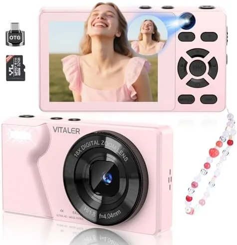 The pink 4K digital camera held in a hand with the lens extended