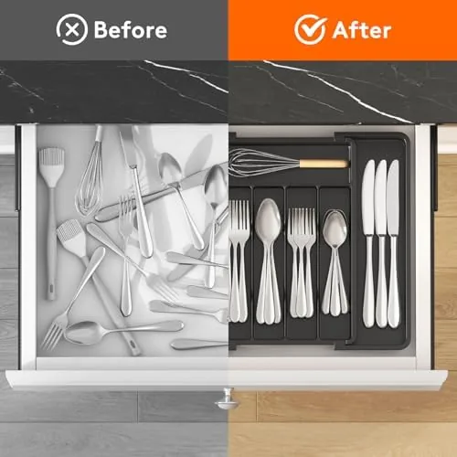 A hand pulling a fork from a neatly organized section of the tray